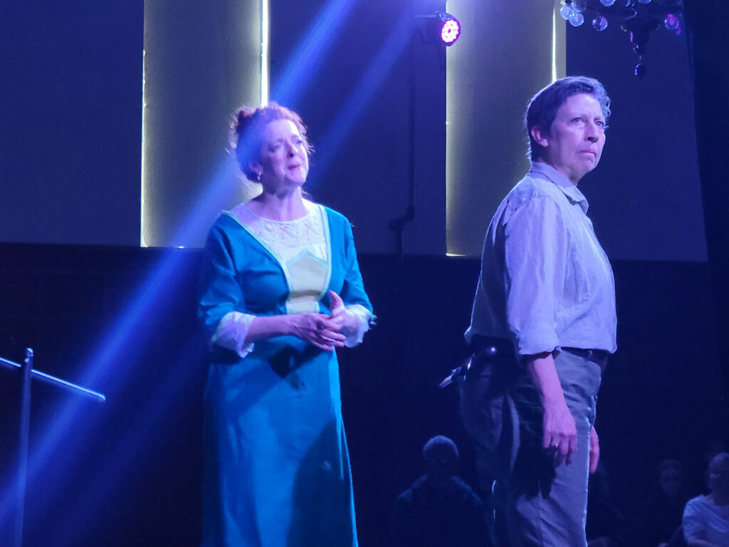 Lady Macbeth (Meg Elliott) pleads with her husband (Barbara Geary).